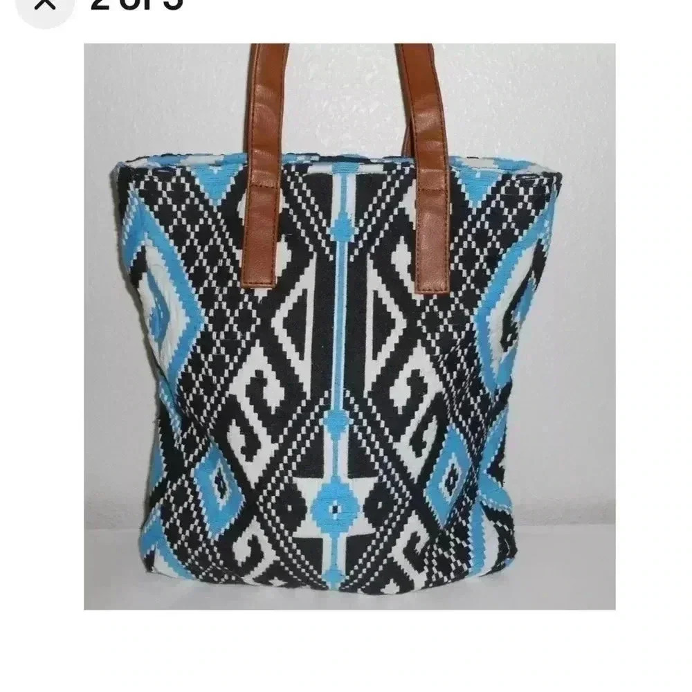 Love Stitch slouchy hobo shoulder bag turquoise blue white